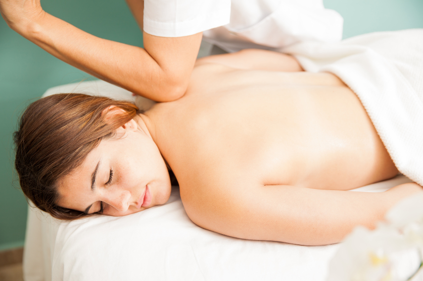 woman receiving deep tissue massage