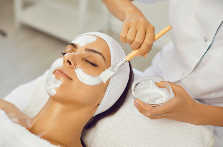 woman receiving facial massage