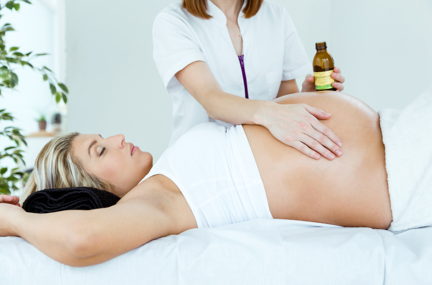 Woman receiving pregnancy massage