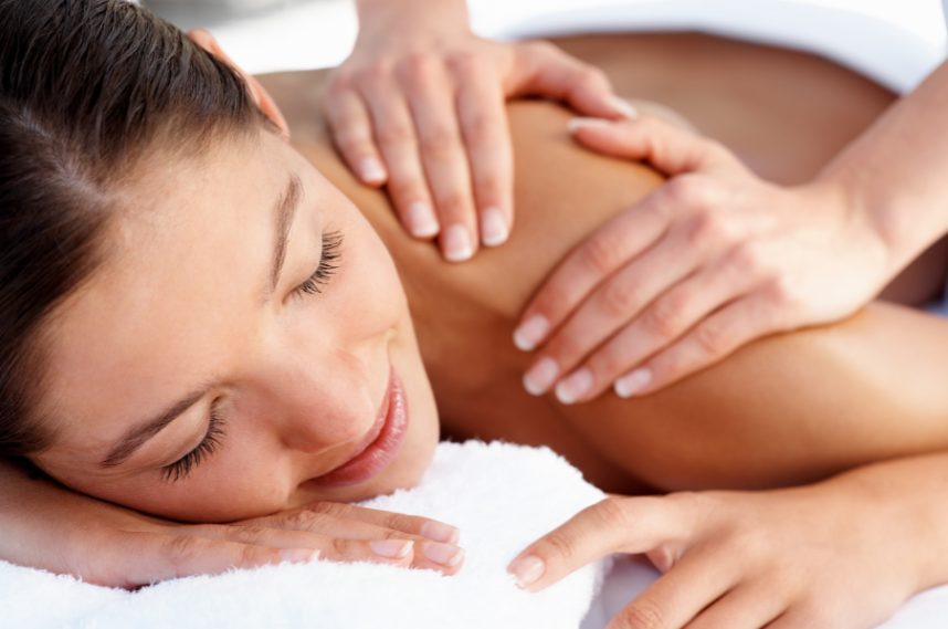 Woman being treated in relaxation massage